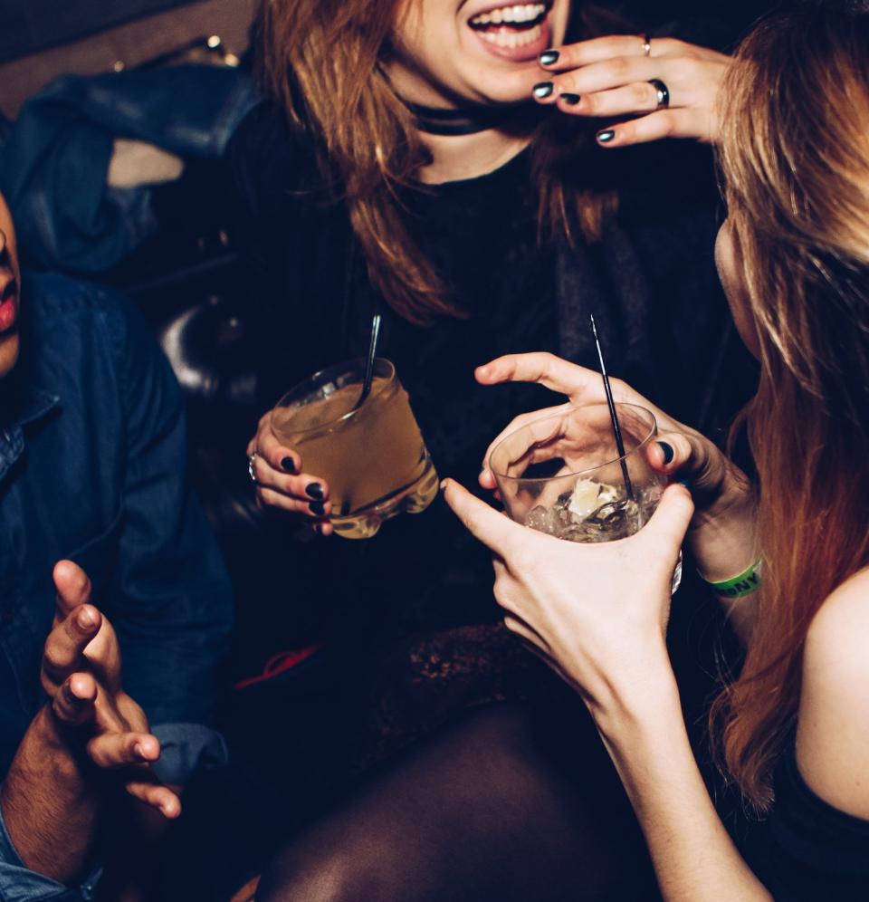 drinking cocktails alcohol night out party booze women laughing