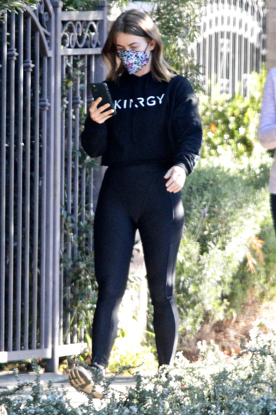 <p>Julianne Hough is seen checking her phone while out for a hike in L.A.</p>