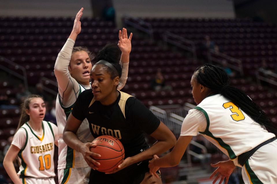 Archbishop Wood junior Deja Evans fights for a rebound during the PIAA Class 4A championship game at Giant Center in Hershey on Thursday, March 24, 2022.