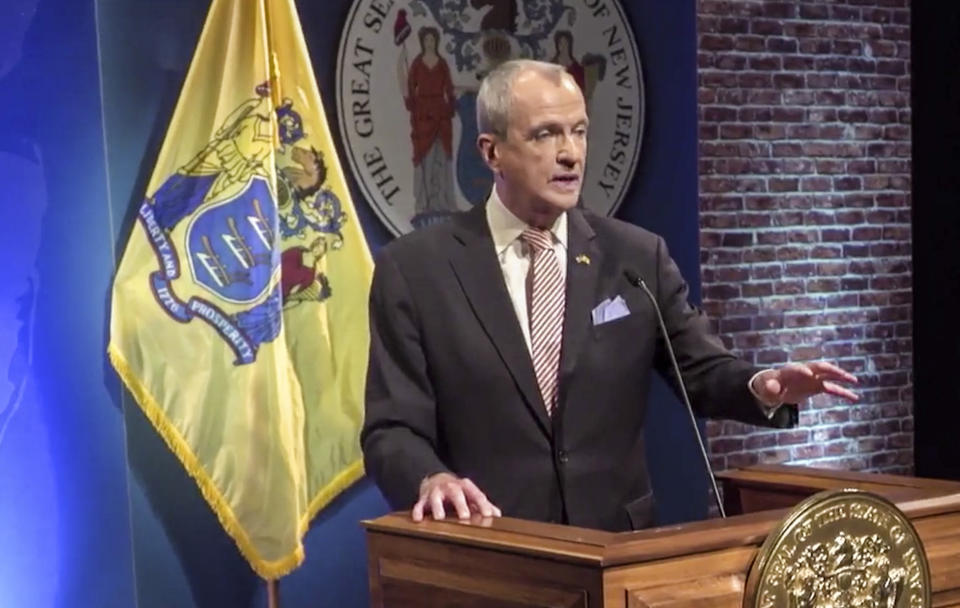 This image taken from video shows New Jersey Democratic Gov. Phil Murphy delivering his fourth state of the state address, saying he would declare a public health emergency again in light of COVID-19's omicron variant, Tuesday, Jan. 11, 2022, in Trenton, N.J. (New Jersey Office of the Governor via AP)