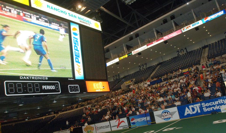 A few hundred people watch the finals of World Cup between France and Italy on the scoreboard screen July 9, 2006, at Stockton Arena.