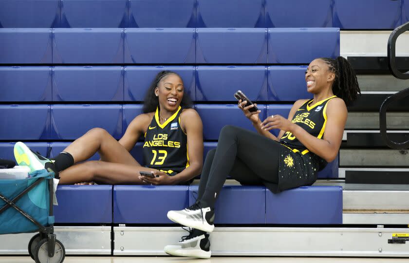 TORRANCE-CA-MAY 4, 2023: Chiney and Nneka Ogwumike, from left, share a laugh during The L.A. Sparks' media day at El Camino College in Torrance on May 4, 2023. (Christina House / Los Angeles Times)