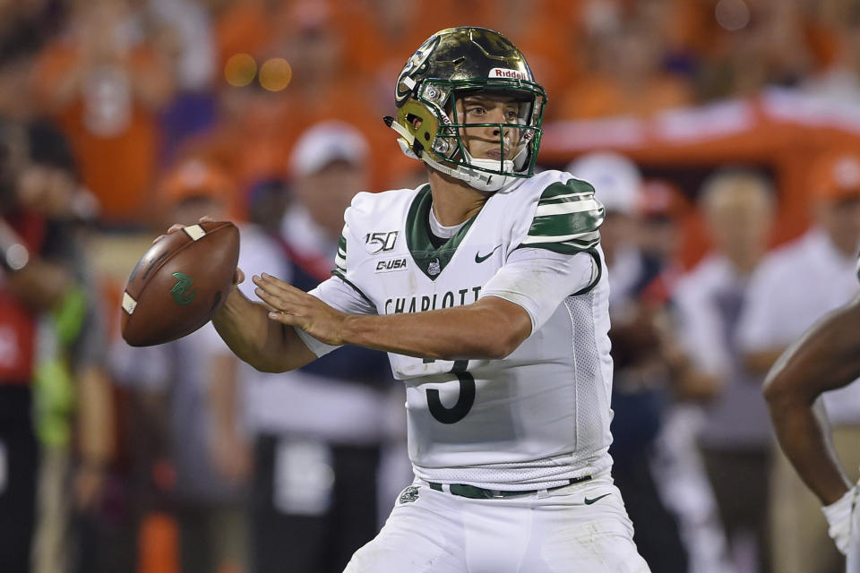 Charlotte quarterback Chris Reynolds drops back to pass during the first half of the team's NCAA college football game against Clemson on Saturday, Sept. 21, 2019, in Clemson, S.C. (AP Photo/Richard Shiro)