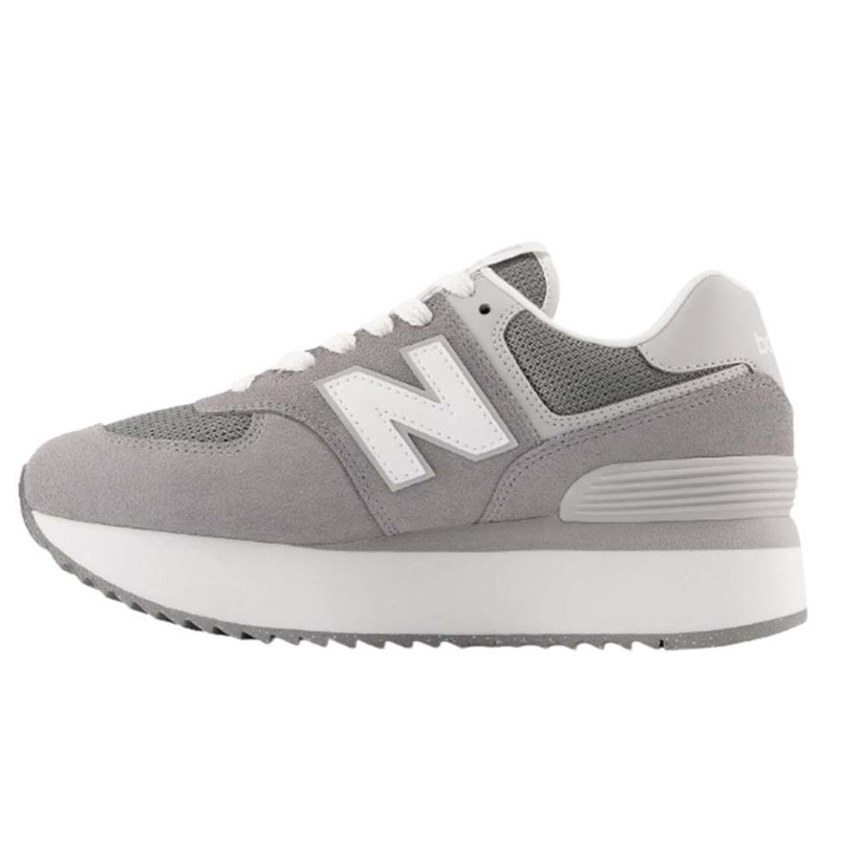 white, blue, and yellow New Balance 2002R sneakers