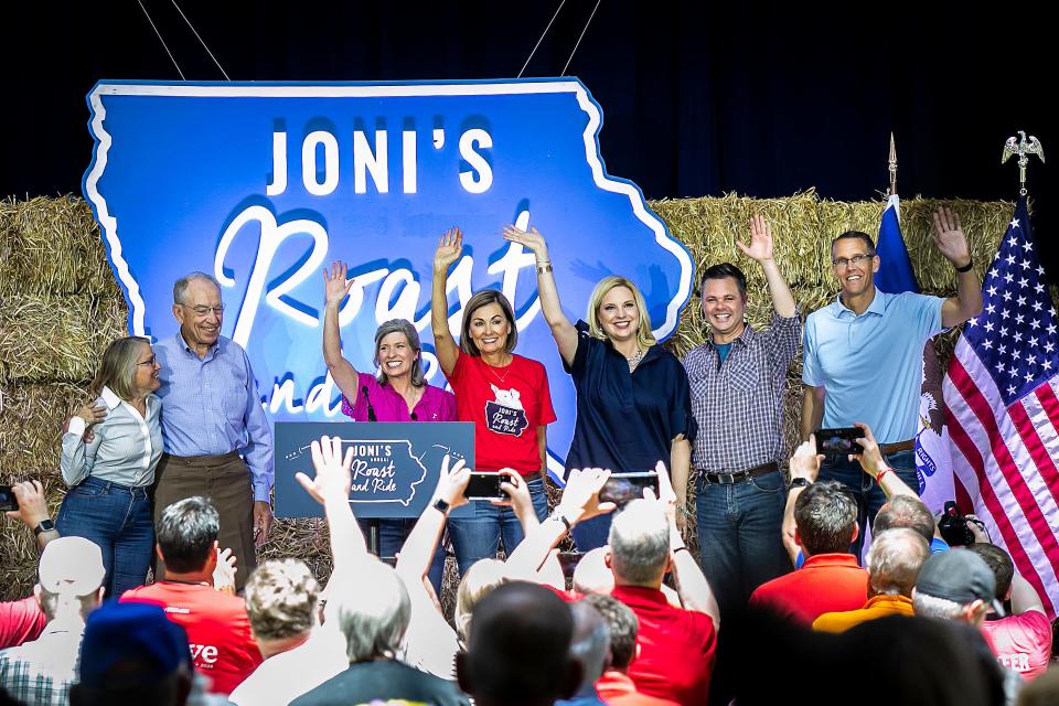From left, Republicans U.S. Rep. Mariannette Miller-Meeks, U.S. Sen. Chuck Grassley, U.S. Sen. Joni Ernst, Iowa Gov. Kim Reynolds, U.S. Reps. Ashley Hinson, Zach Nunn and Randy Feenstra are acknowledged during the annual Roast and Ride fundraiser for U.S. Sen. Joni Ernst, Saturday, June 3, 2023, at the Iowa State Fairgrounds in Des Moines, Iowa.
