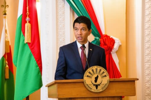 Madagascar President Andry Rajoelina hopes to beat long time rival Marc Ravalomanana in legistive elections Monday