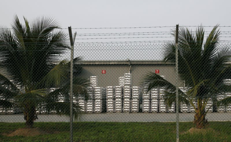 FILE PHOTO: Aluminium ingots are seen outside a warehouse that stores London Metal Exchange stocks in Port Klang Free Zone, outside Kuala Lumpur