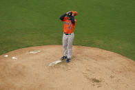 Houstnn Astros starting pitcher Lance McCullers Jr. adjusts his cap during the second inning in Game 7 of a baseball American League Championship Series against the Tampa Bay Rays, Saturday, Oct. 17, 2020, in San Diego. (AP Photo/Gregory Bull)