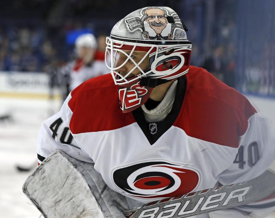 Carolina Hurricanes equipment manager Jorge Alves warms up after signing a contract to dress as an emergency backup for the team's NHL hockey game against the Tampa Bay Lightning, Saturday, Dec. 31, 2016, in Tampa, Fla. (AP Photo/Mike Carlson)