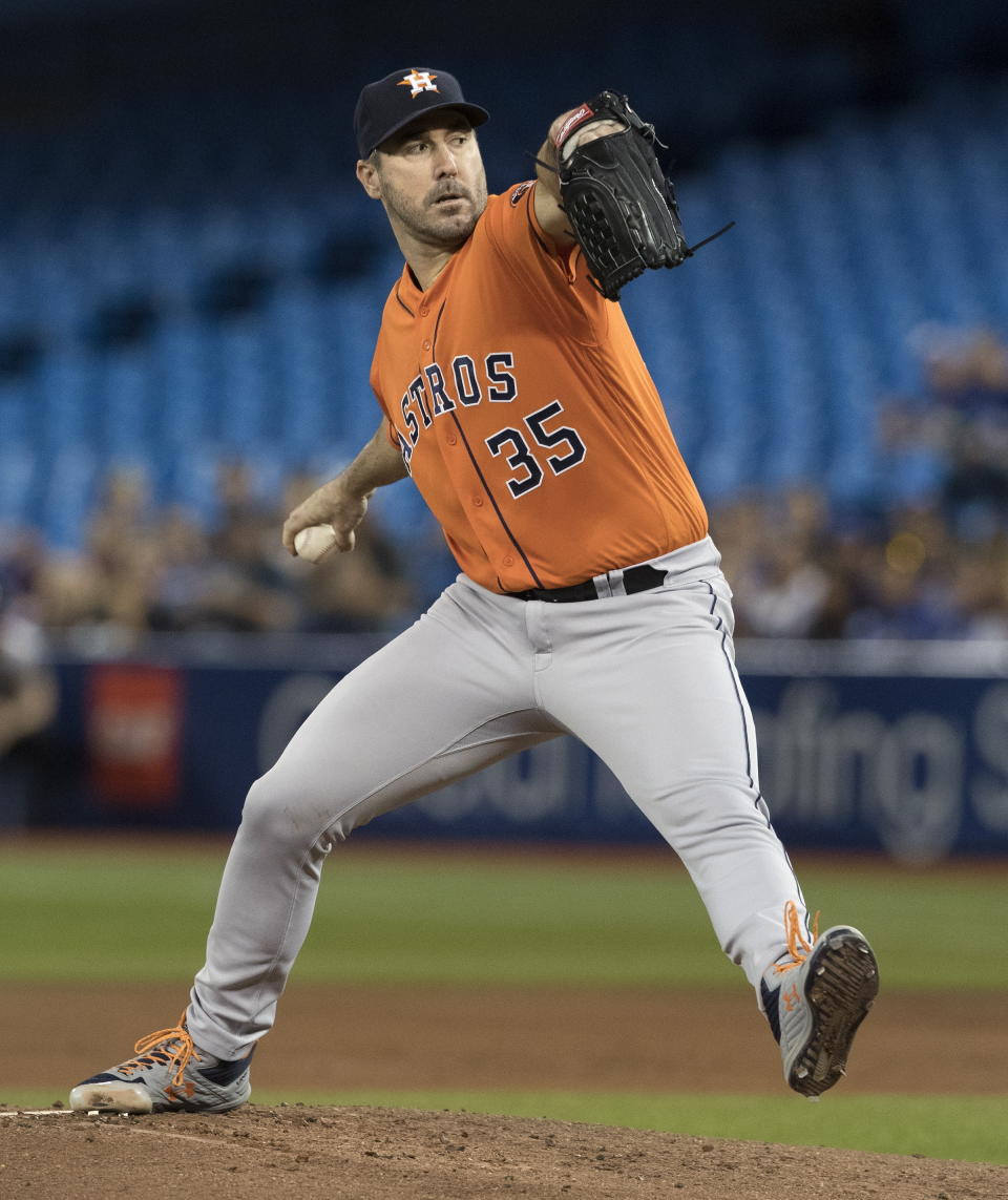 Houston Astros starting pitcher Justin Verlander throws against the Toronto Blue Jays during the first inning of a baseball game in Toronto, Sunday, Sept. 1, 2019. (Fred Thornhill/The Canadian Press via AP)