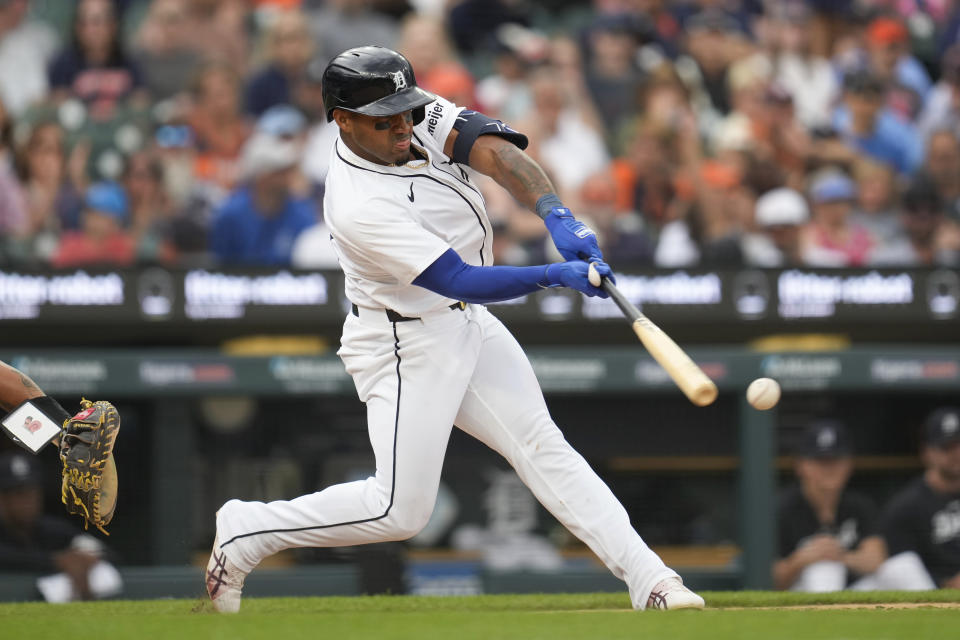 Detroit Tigers' Andy Ibáñez hits a one-run single against the Milwaukee Brewers in the fifth inning of a baseball game, Sunday, June 9, 2024, in Detroit. (AP Photo/Paul Sancya)