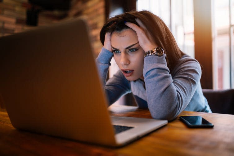 <span class="caption">‘Why didn’t I upgrade?’</span> <span class="attribution"><a class="link " href="https://www.shutterstock.com/image-photo/frustrated-worried-young-woman-looks-laptop-1047662398" rel="nofollow noopener" target="_blank" data-ylk="slk:Tatomirov/Shutterstock;elm:context_link;itc:0;sec:content-canvas">Tatomirov/Shutterstock</a></span>