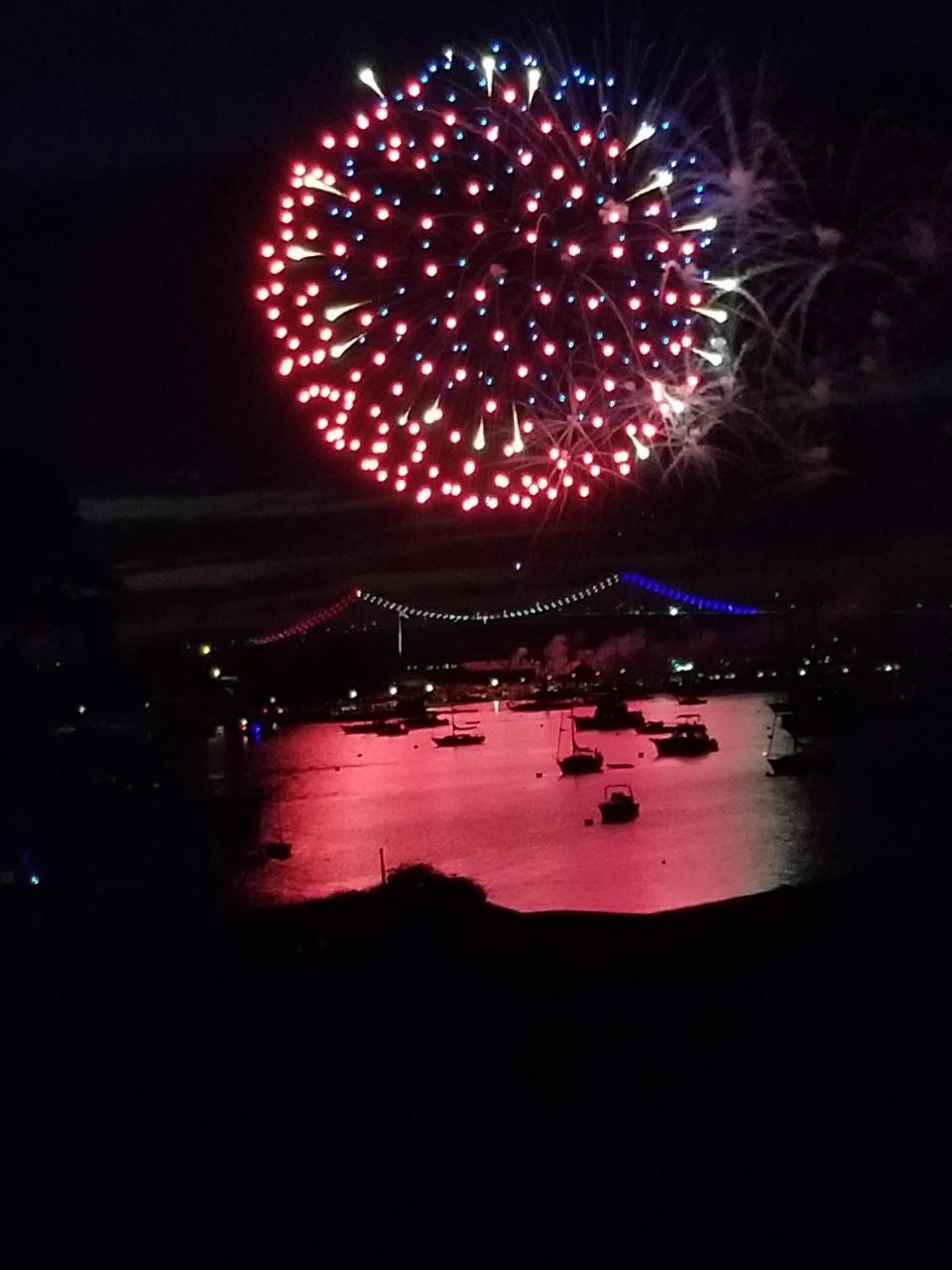 Fireworks explode over the Newport Pell Bridge in 2019.