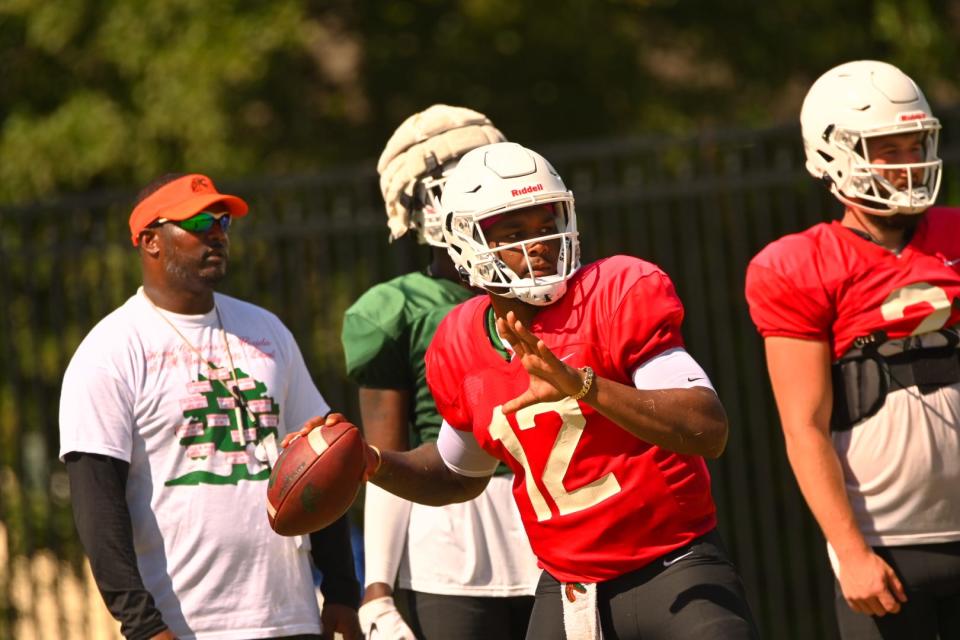 Florida A&M University quarterback Rasean McKay attempts a pass during fall training camp, Aug. 4, 2022