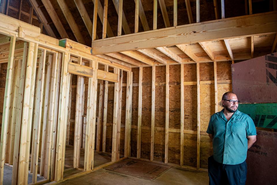Ponkho Bermejo inside one of BeLoved Asheville’s tiny homes July 13, 2023.
