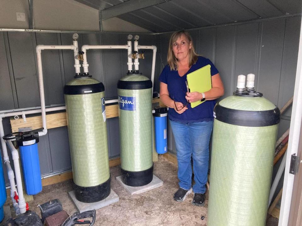 A small shed near Kim Weatherford’s home in Darlington County houses a system of filters. Environmental regulators installed them after forever chemicals were found in her family’s drinking water. Photo taken November 2022, 2023