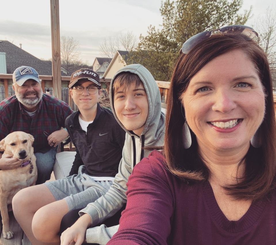Devlin shares a happy moment with her sons Sean and Conor, her husband, Brandon, and Lulu the dog. (Courtesy Andria Devlin)