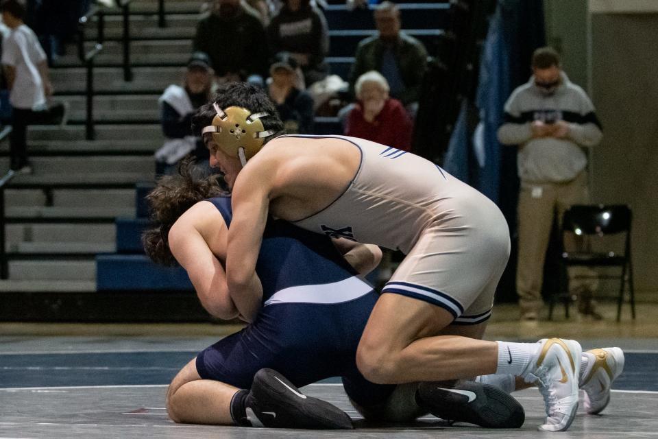 Council Rock South's Bek Sadriddinov, top, wrestles in a meet from last season.