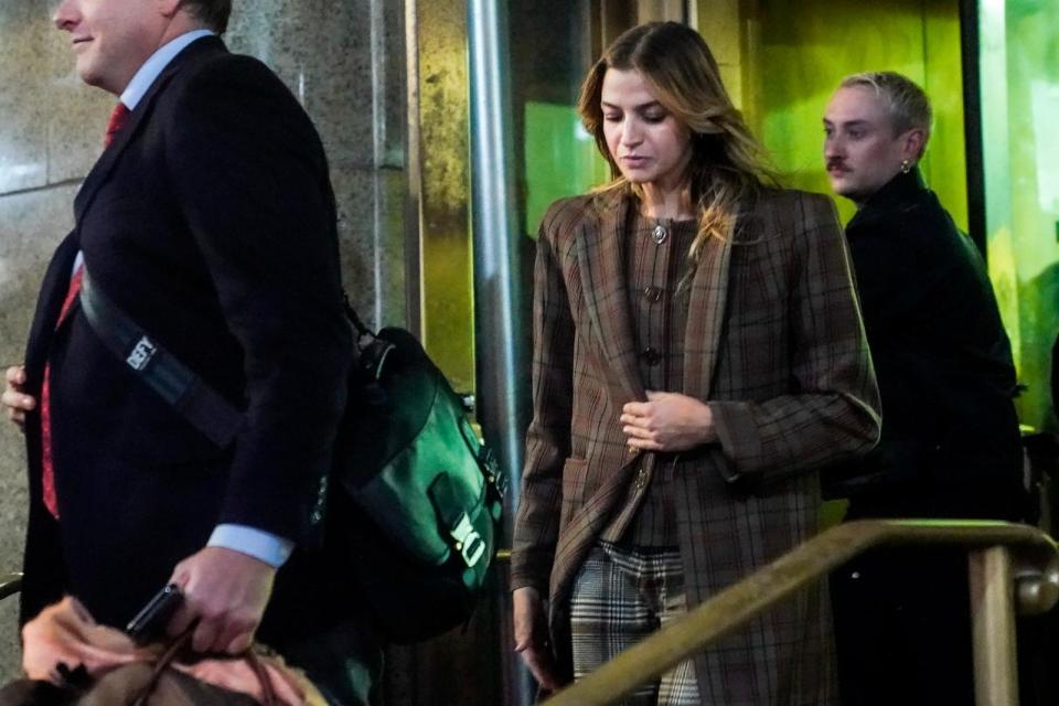 PHOTO: Grace Jabbari, center, the accuser in the assault case against Jonathan Majors, leaves court after giving testimony, Dec. 5, 2023, in New York. (Bebeto Matthews/AP)