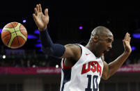United States' Kobe Bryant reacts after a dunk during a men's gold medal basketball game against Spain at the 2012 Summer Olympics, Sunday, Aug. 12, 2012, in London. (AP Photo/Eric Gay)