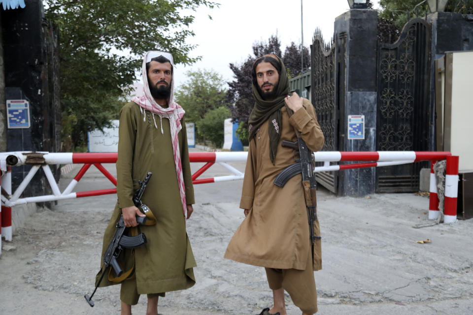 Taliban fighters pose for photograph in Kabul, Afghanistan, Tuesday, July 25, 2023. The Taliban announced Tuesday that all beauty salons in Afghanistan must now close as a one-month deadline ended, despite rare public opposition to the edict. (AP Photo/Siddiqullah Khan)