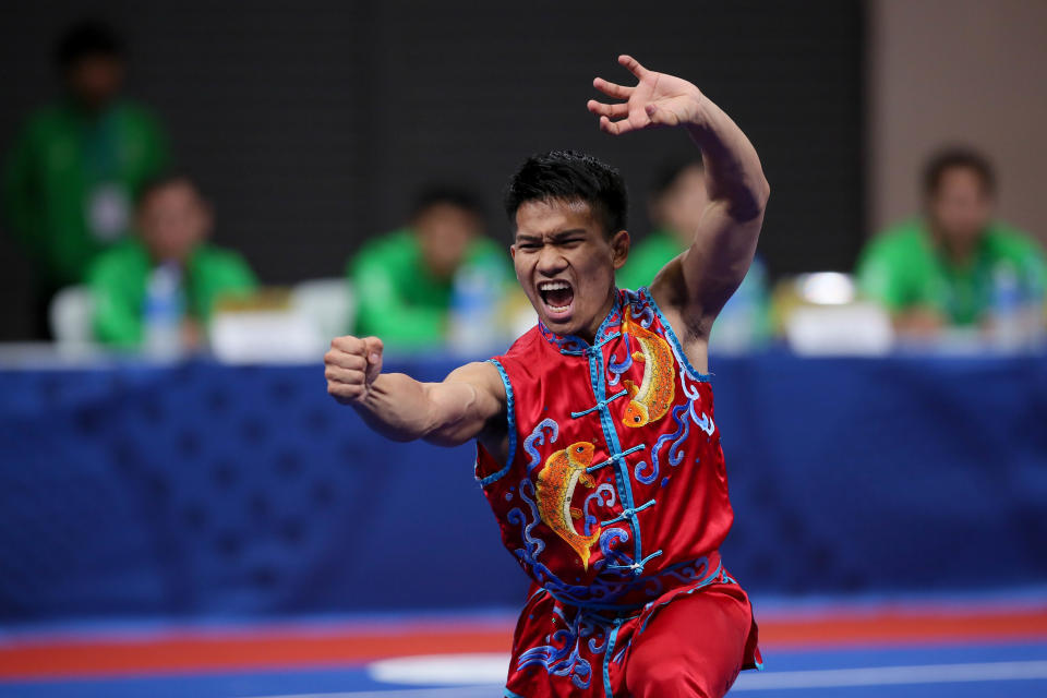 Mohammad Adi Salihin Roslan of Brunei Darussalam performs his routine during the Wushu Taoulu Men's Nanquan event for the 30th SEA Games held in Manila on December 3, 2019. (Photo by George Calvelo/NurPhoto via Getty Images)