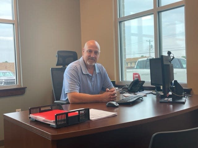 Vernon Ashway sits at his desk in the Washington Township municipal building. After 34 years with the police department and in administration, he became township manager on July 29.