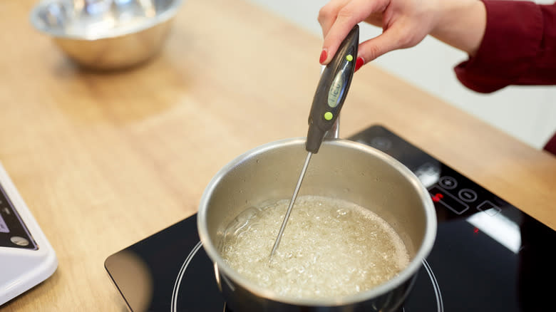 Boiling sugar in pot