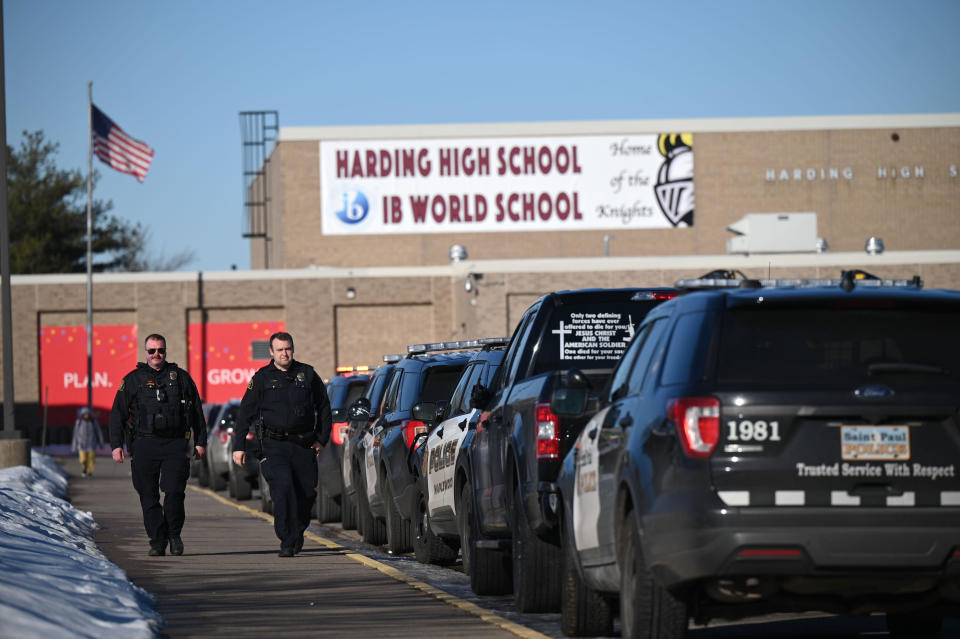 Police officers are seen outside Harding High School in St. Paul, Minnesota, following a stabbing on February 10, 2023. / Credit: Aaron Lavinsky/Star Tribune via Getty Images