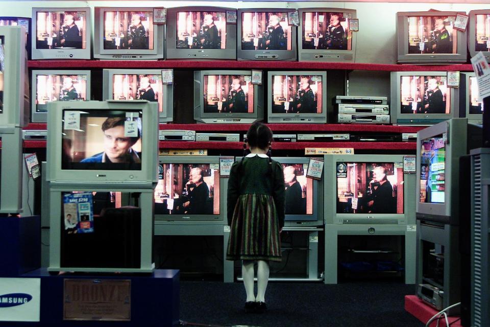 (AUSTRALIA OUT) Heidi Lamb looking at flat screen televisions at Harvey Norman, 18 July 2005. SMH Picture by EDWINA PICKLES (Photo by Fairfax Media via Getty Images/Fairfax Media via Getty Images via Getty Images)