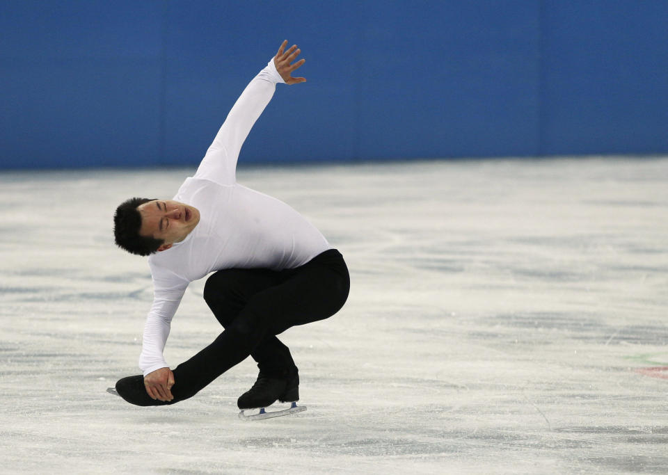 Patrick Chan of Canada practices during a figure skating practice session at the Iceberg Skating Palace ahead of the 2014 Winter Olympics, Monday, Feb. 3, 2014, in Sochi, Russia. (AP Photo/Mark Baker)