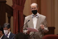 Democratic State Sen. Steve Glazer discusses a measure to place a Constitutional amendment on the ballot to ban involuntary servitude as punishment for a crime, at the Capitol in Sacramento, Calif., Thursday, June 23, 2022. Glazer joined others in voting against the bill and it failed to get enough votes for passage. California's Constitution bans both slavery and involuntary servitude, forcing someone to provide labor against their will, but there is an exception for the punishment of a crime. (AP Photo/Rich Pedroncelli)