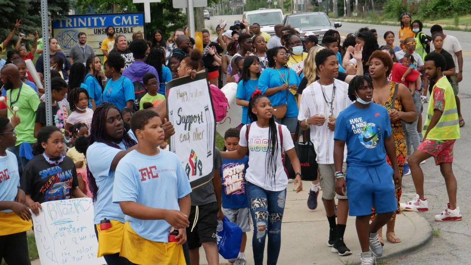 Roughly 150 people walked through Indianapolis' Martindale-Brightwood neighborhood in honor of Juneteenth.