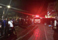 <p>An ambulance rushes out of the hospital after an earthquake rocked Indonesia’s Lombok island, in Mataram on Aug. 5, 2018. (Photo: Rita Siswati/AFP/Getty Images) </p>