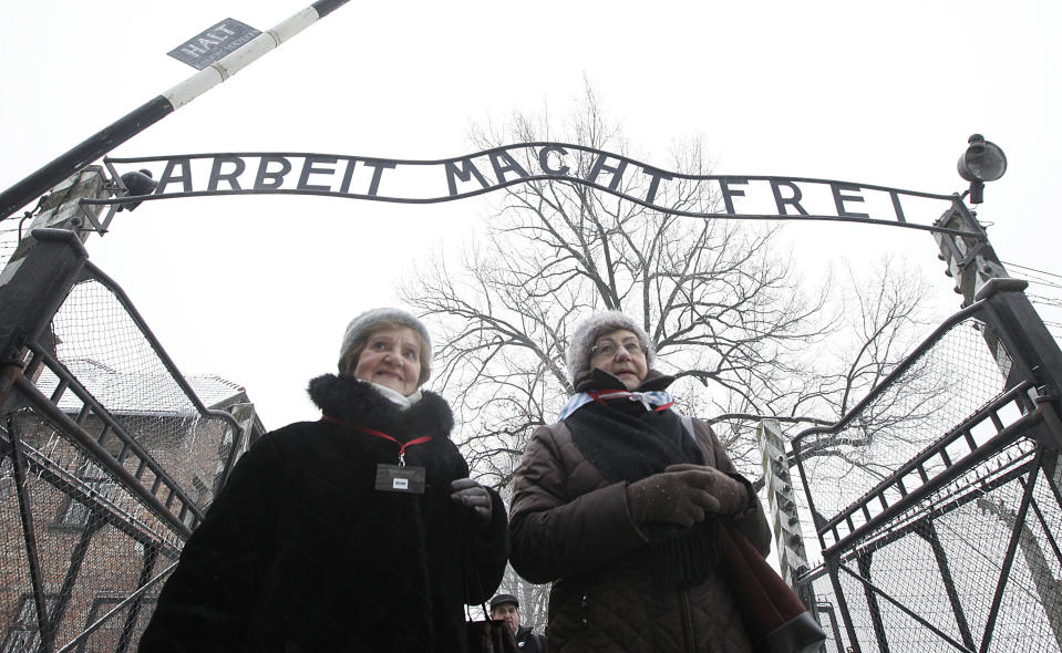 Holocaust survivors arrive for a ceremony to mark the 69th anniversary of the liberation of Auschwitz Nazi death camp's in Oswiecim, Poland, on Monday, Jan. 27, 2014, since the Soviet Red Army liberated the camp. Israeli lawmakers and government officials are to attend anniversary observances later in the day. The Nazis killed some 1.5 million people, mostly Jews at the camp during World War II. (AP Photo/Czarek Sokolowski)