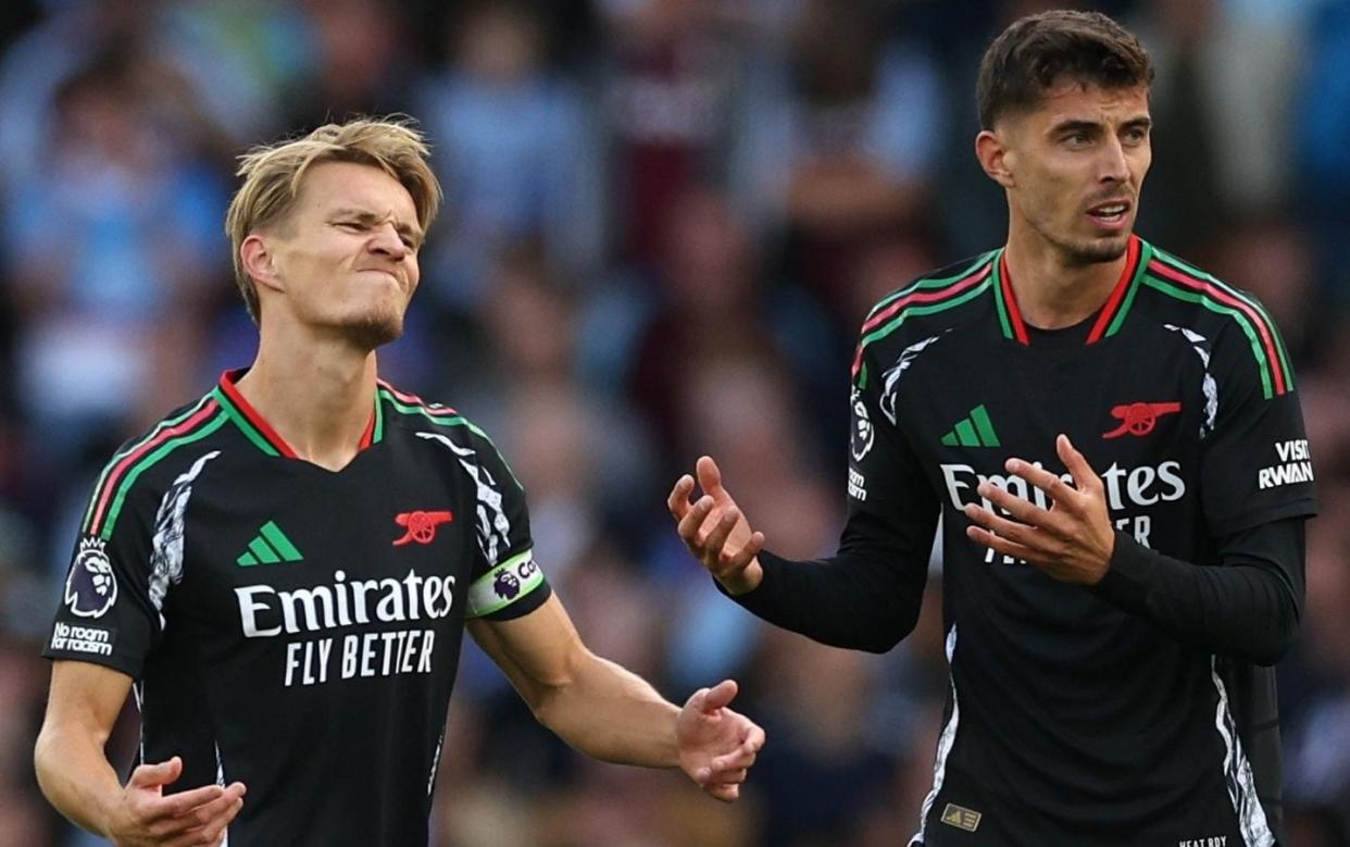 Martin Odegaard, left, and Kai Havertz of Arsenal react during Arsenal's 2-0 win at Aston Villa, 24 August 2024