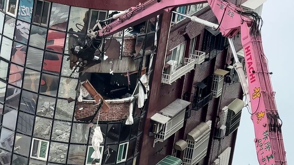 Heavy equipment being used to demolish the Uranus building in Hualien. - Yan Zhao/AFP/Getty Images