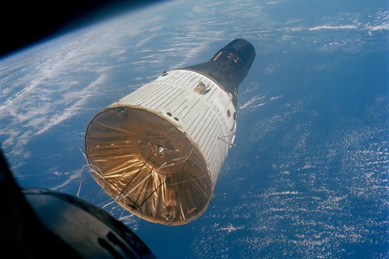 This photograph of the Gemini-Titan 7 (GT-7) spacecraft was taken from the Gemini-Titan 6 (GT-6) spacecraft during the historic rendezvous of the two spacecraft on Dec. 15, 1965. The two spacecraft are some 37 feet apart here. Earth can be seen below. Astronauts Walter M. Schirra Jr., command pilot, and Thomas P. Stafford, pilot, were inside the GT-6 spacecraft, while crewmen for the GT-7 mission were astronauts Frank Borman, the command pilot, and James A. Lovell Jr., pilot. Photo courtesy of NASA