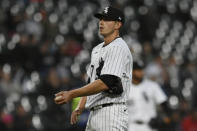 Chicago White Sox starting pitcher Chris Flexen reacts after Cincinnati Reds' Elly De La Cruz hit a three-run home run during the third inning of a baseball game Friday, April 12, 2024, in Chicago. (AP Photo/Paul Beaty)