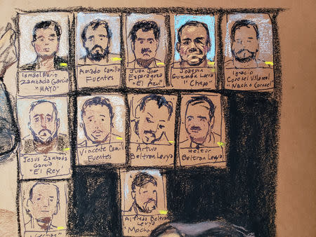 Photos showing hierarchy of cartel is on display during the trial of the accused Mexican drug lord Joaquin "El Chapo" Guzman (not whown), in this courtroom sketch in Brooklyn federal court in New York, U.S., November 19, 2018. REUTERS/Jane Rosenberg