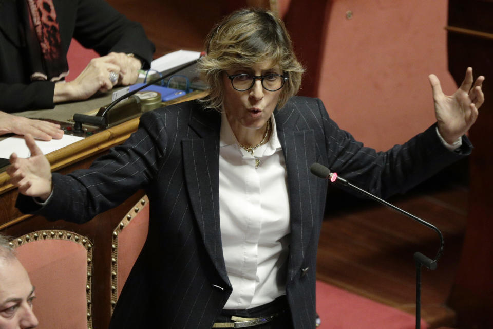 Senator Giulia Bongiorno speaks during the debate on whether to allow opposition populist leader Matteo Salvini to be prosecuted – as he demands to be -- for alleging holding migrants hostage for days aboard a coast guard ship instead of letting them immediately disembark in Sicily while he was interior minister. (AP Photo/Andrew Medichini)