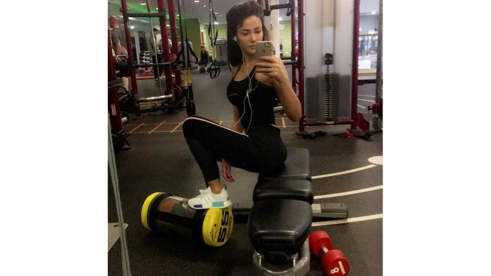 woman in gym taking selfie 