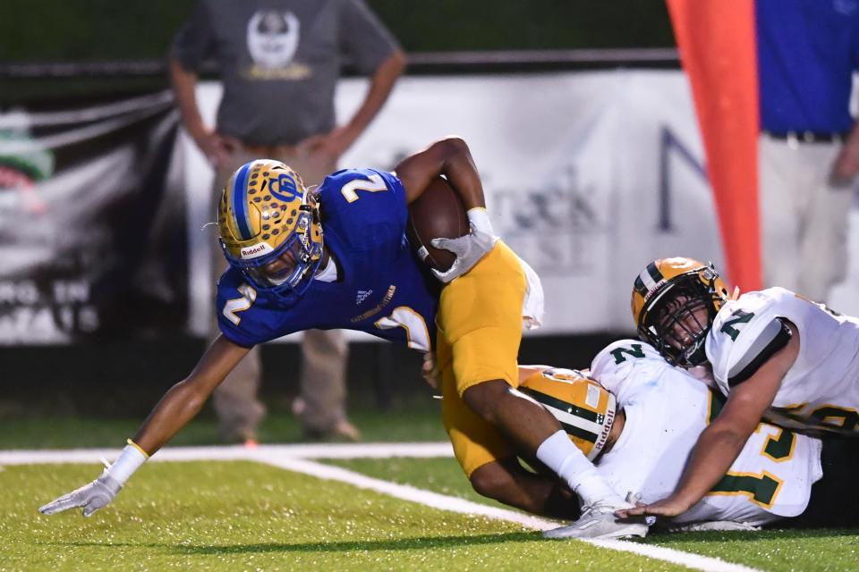 Gatlinburg-Pittman's Carlos Orr (2) is tackled by the Northview Senior Academy defense on Thursday, September 3, 2020. 