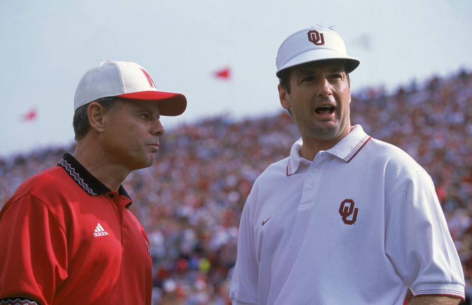 A close up of Head Coach Bob Stoops of the Oklahoma Sooners as he talks with Head Coach Frank Solick of the Nebraska Cornhuskers during the game at the Oklahoma Memorial Stadium in Norman, Oklahoma, on Oct. 28, 2000. The Sooners defeated the Cornhuskers 31-14. Brian Bahr /Allsport