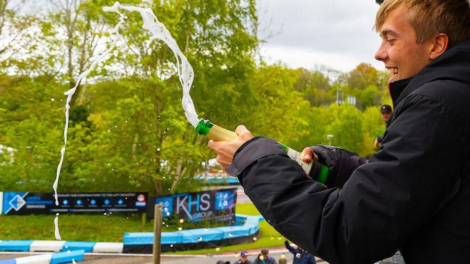 Champagne corks popping at Buckmore Park after a 24-hour marathon race