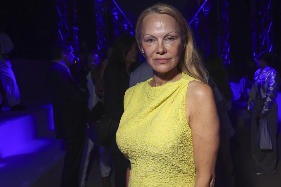 Pamela Anderson attends the Isabel Marant Spring/Summer 2024 womenswear fashion collection presented Thursday, Sept. 28, 2023 in Paris. (AP Photo/Vianney Le Caer)