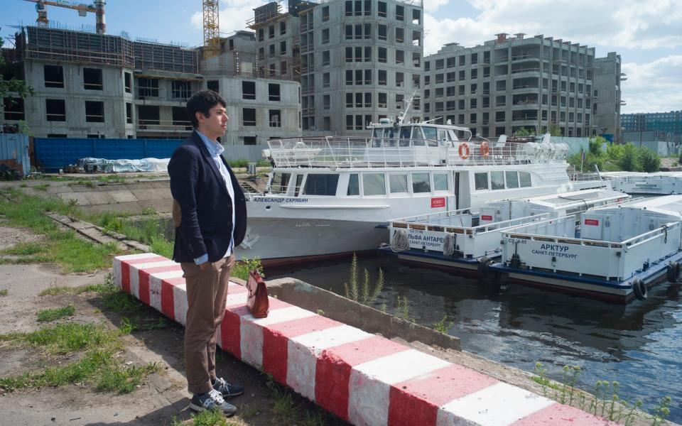 St. Petersburg tourism businessmen Nikolai Predtechensky in front of his pleasure boats, which are docked in a yacht-club as the civil navigation is suspended - Maria Turchenkova