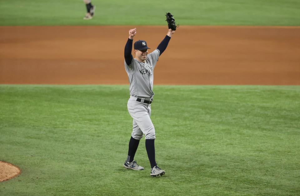 New York Yankees starting pitcher Corey Kluber (28) celebrates after throwing a no-hitter against the Texas Rangers in 2021.