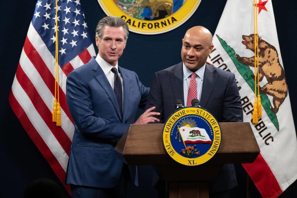 Gov. Gavin Newsom introduces Joe Stephenshaw, director of the California Department of Finance, as he releases his revised $288 billion budget proposal in Sacramento on May 10.