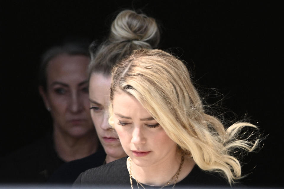 US actress Amber Heard departs the Fairfax County Circuit Courthouse in Fairfax, Virginia, on June 1, 2022. – US actress Amber Heard said she was disappointed “beyond words” Wednesday after a jury found she had made defamatory claims of abuse against her ex-husband Johnny Depp, calling it a “setback” for women. (Photo by Brendan SMIALOWSKI / AFP) (Photo by BRENDAN SMIALOWSKI/AFP via Getty Images)